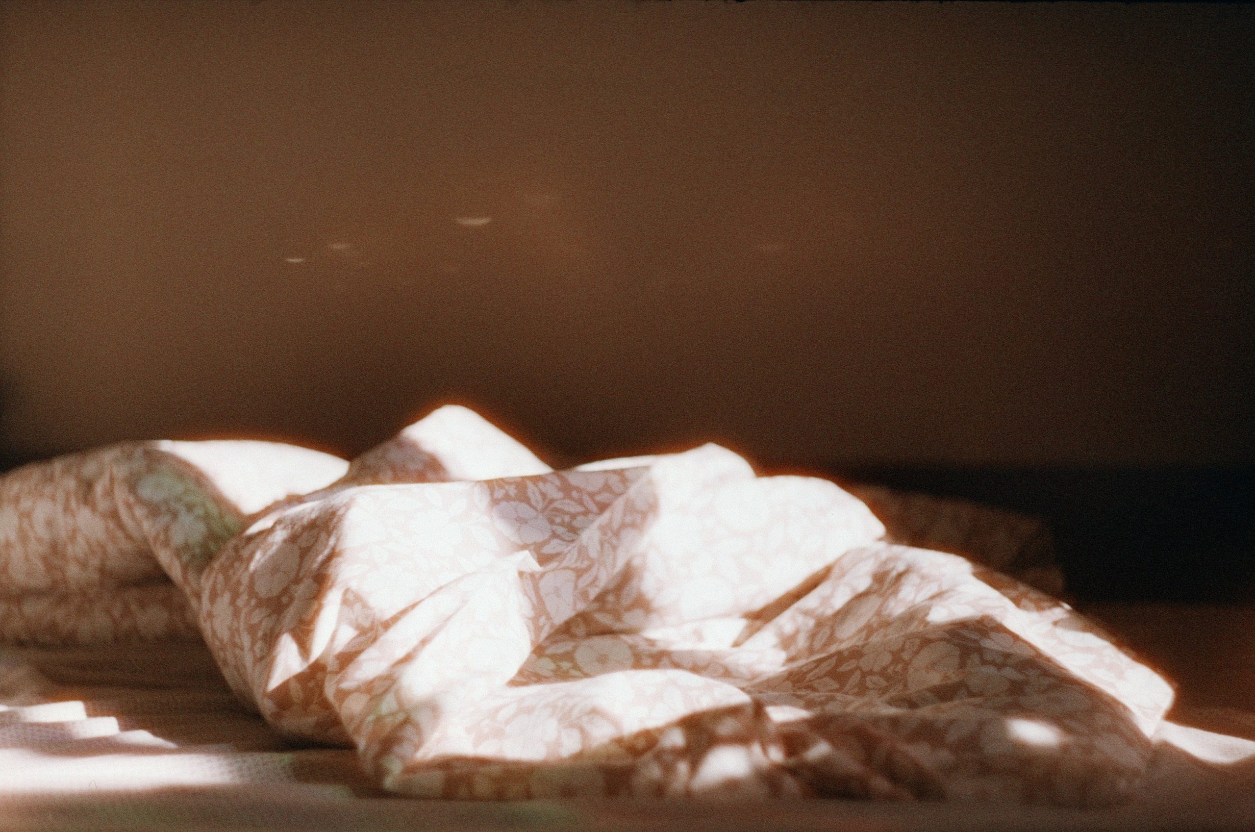 Architect working on blueprints with stone samples on the desk, luxurious office setting