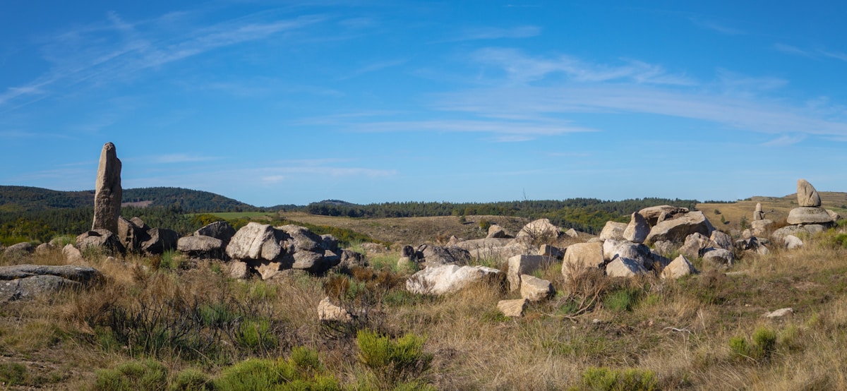 Ancient stone ruins under a clear blue sky.