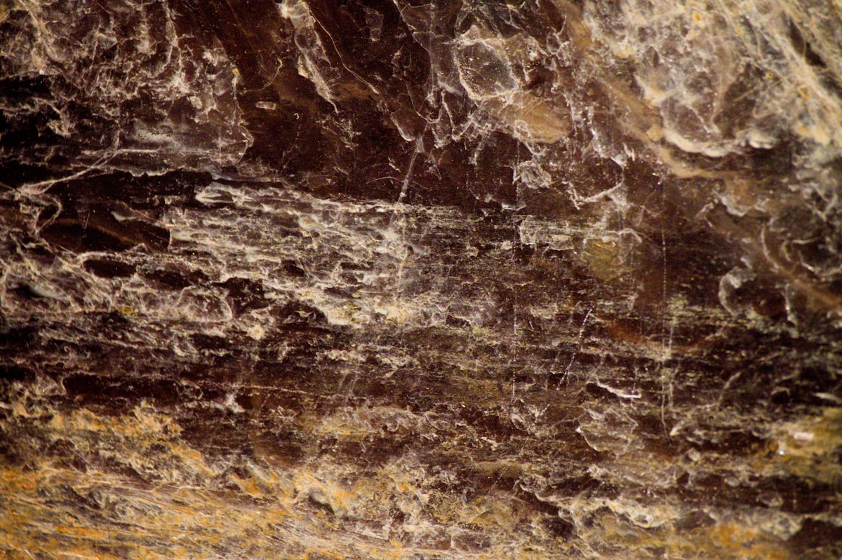 Abstract textured background with brown and white layers