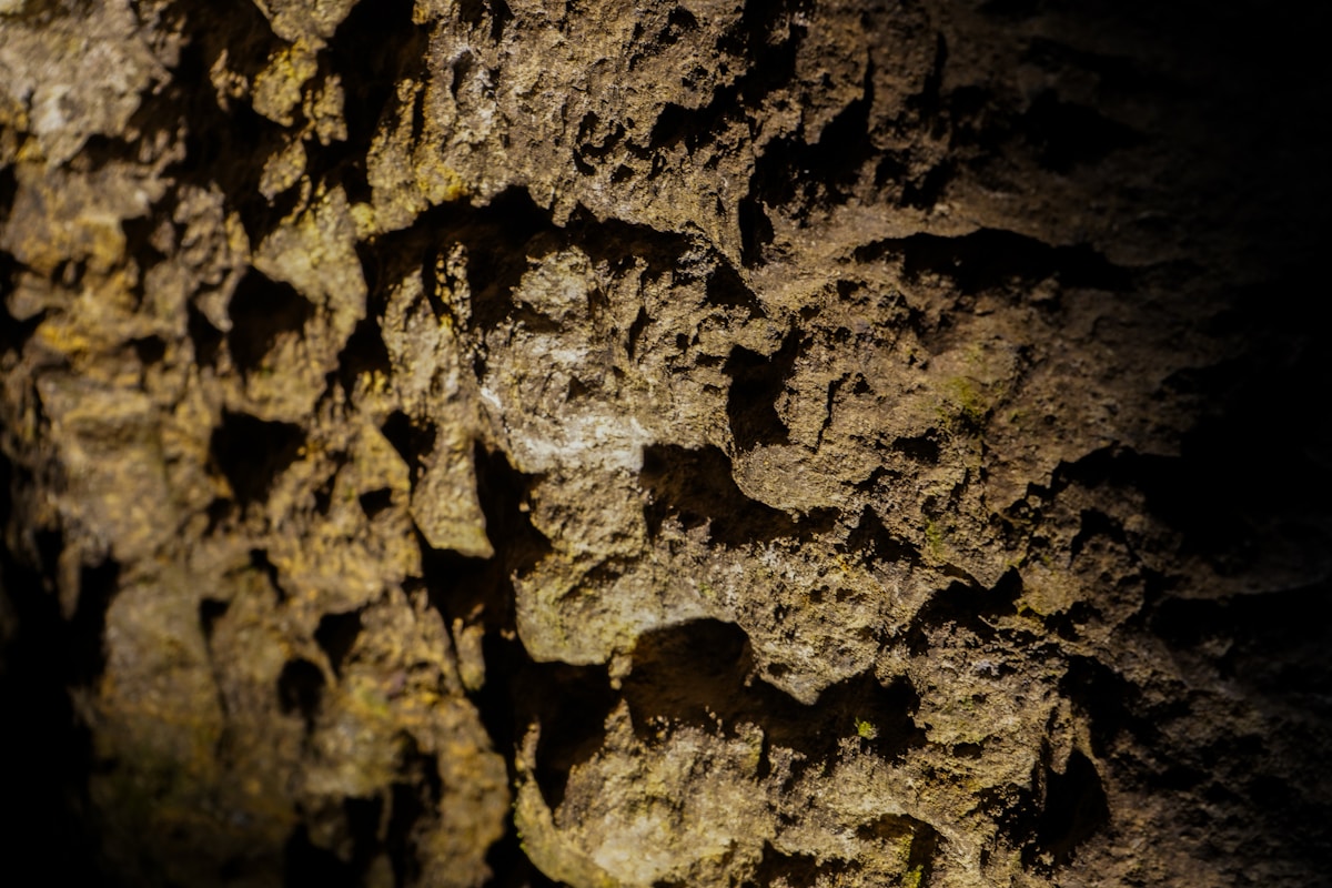 Rough textured cave wall with shadows