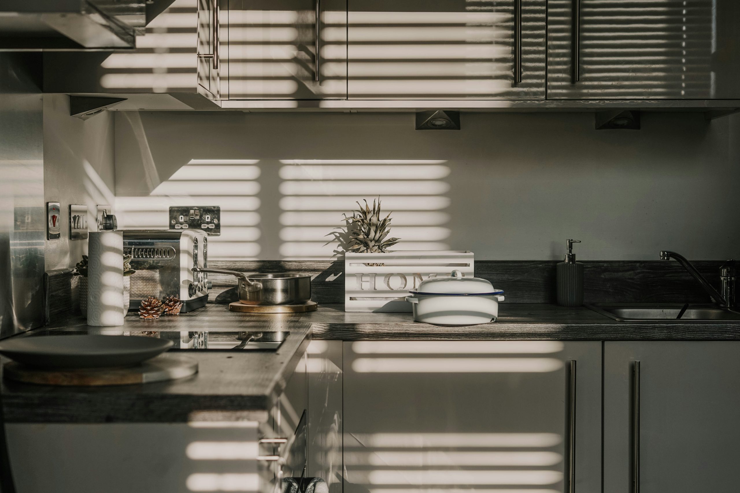 Luxury modern kitchen utilizing backlit onyx slab island