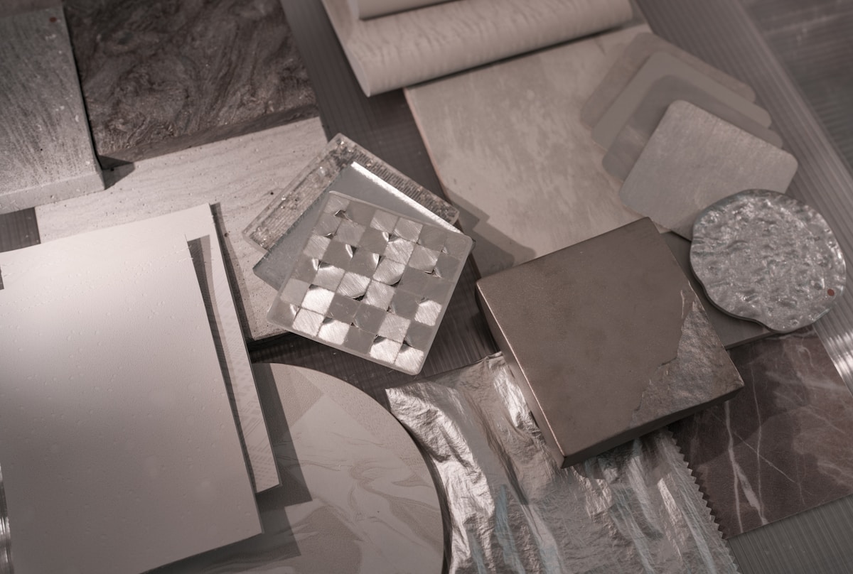 Various material samples are arranged on a surface.