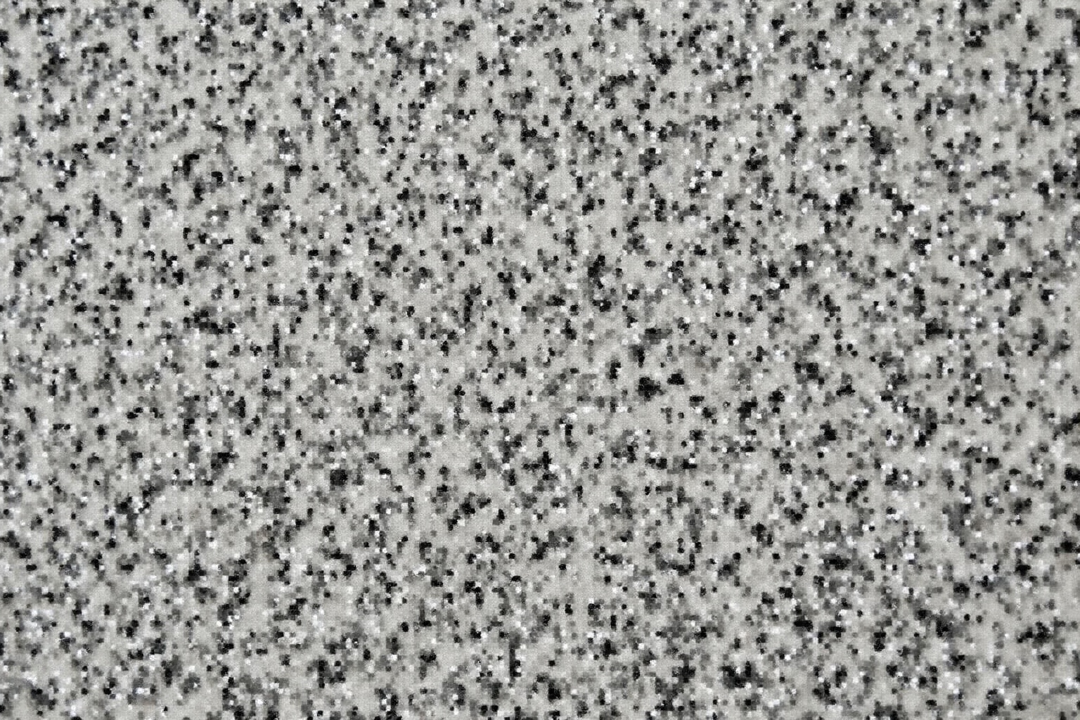 Texture granuleuse en noir et blanc.