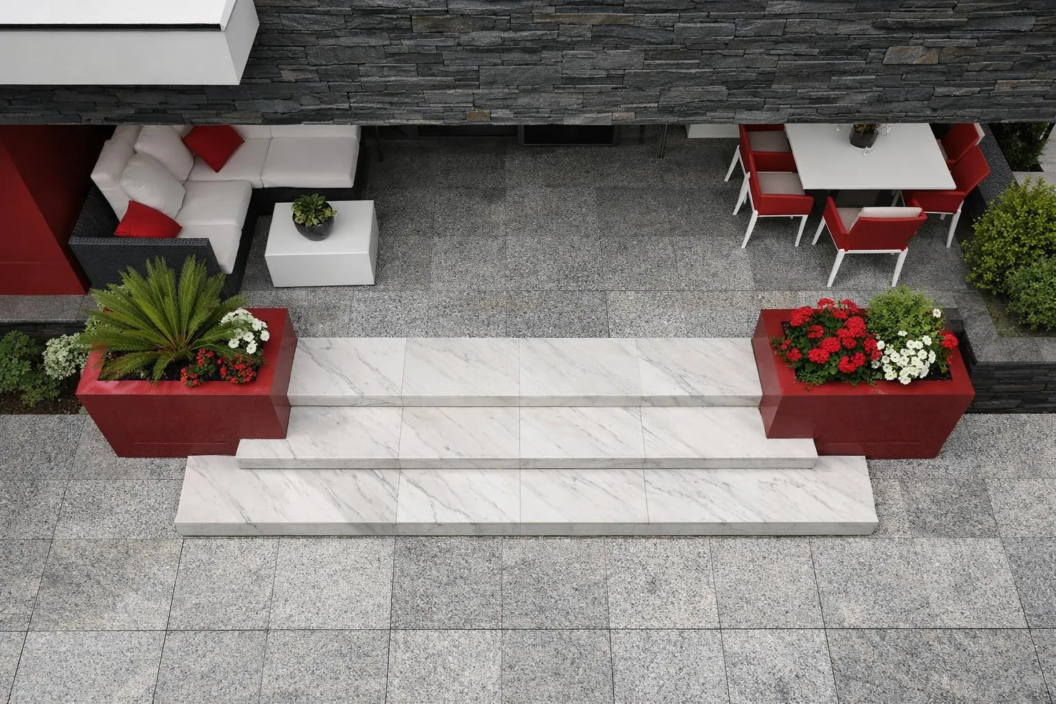 Terrasse extérieure moderne avec mobilier rouge et blanc.
