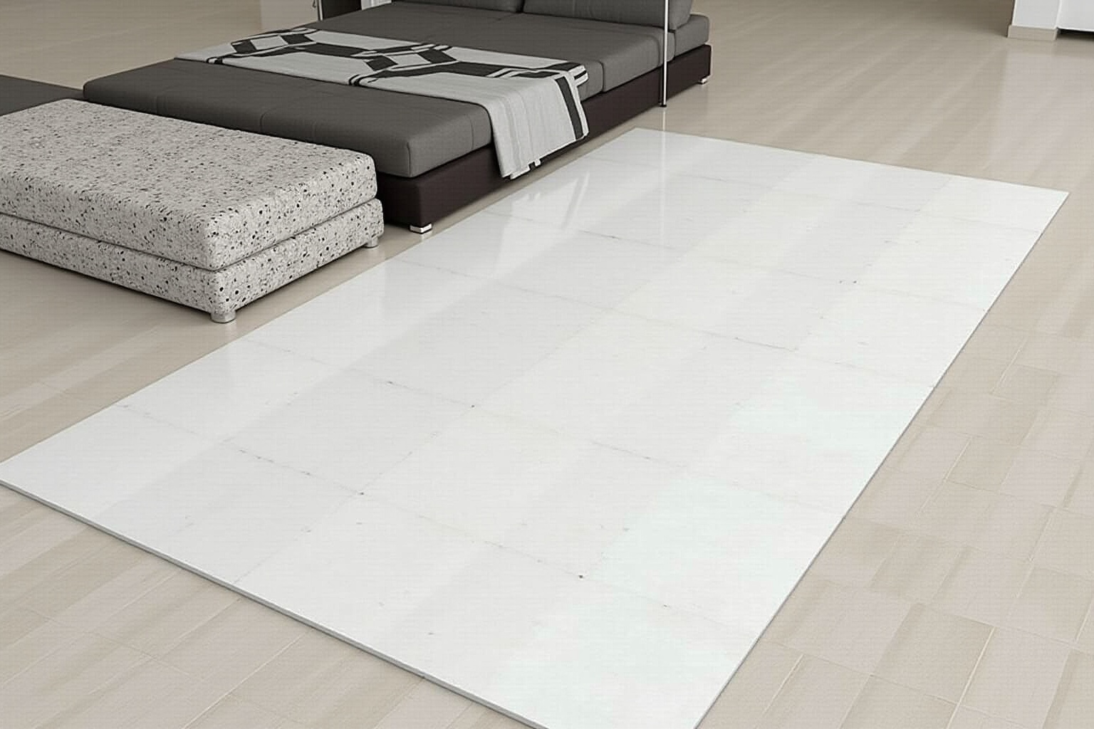 Chambre moderne avec lit et tapis gris.